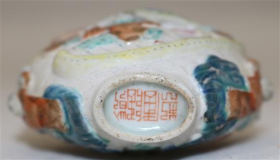 A Chinese famille rose moulded porcelain snuff bottle, Qianlong mark, c.1821-50, height 6.2cm